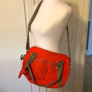 Kipling Bright Orange Crossbody Bag with Tan Straps